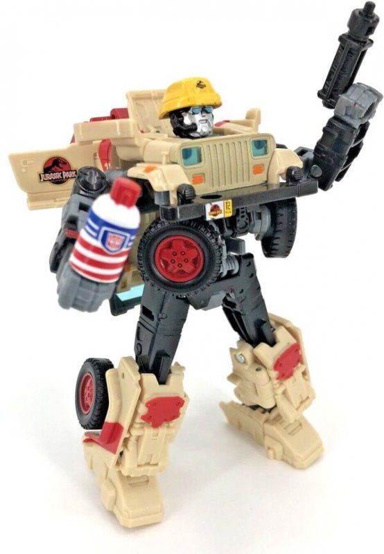 Image of Autobot JP12 Dennis Nedry from Transformers x Jurassic Park Collaborative (11)__scale...jpg